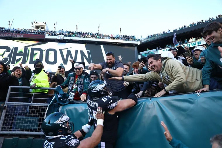 Philadelphia Eagles offensive tackle Lane Johnson (65), scores a touchdown and runs to fans to celebrate during the fourth quarter of the game against the New York Giants at the Lincoln Financial Field in Philadelphia, Pa., on Sunday, Dec., 26, 2021.