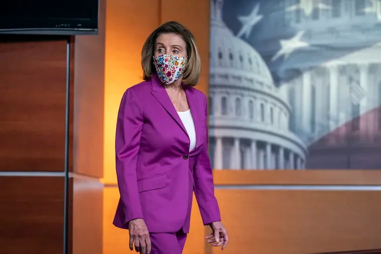 Speaker of the House Nancy Pelosi, D-Calif., holds a news conference on the day after violent protesters loyal to President Donald Trump stormed the U.S. Congress, at the Capitol in Washington on Thursday.