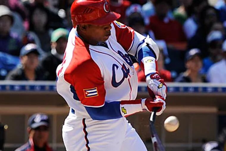 The Phillies are among the teams that have watched Yoenis Cespedes (above) and Jorge Soler work out. (Mark J. Terrill/AP)