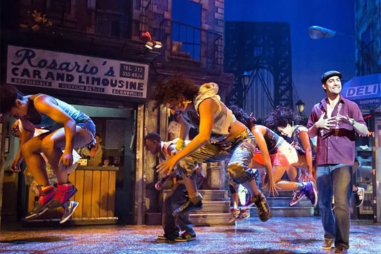 Perry Young, in the central role of the bodega owner, with the ensemble of the musical &quot;In the Heights&quot; at Walnut Street Theatre.
