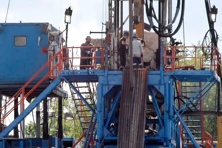 A crew works on a drilling rig in Butler County, Pa. The EPA said that while it had not found systemic impacts on water resources, &quot;there are potential vulnerabilities.&quot;