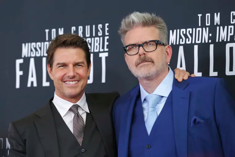 Tom Cruise with director Christopher McQuarrie. We'll assume you know which is which.