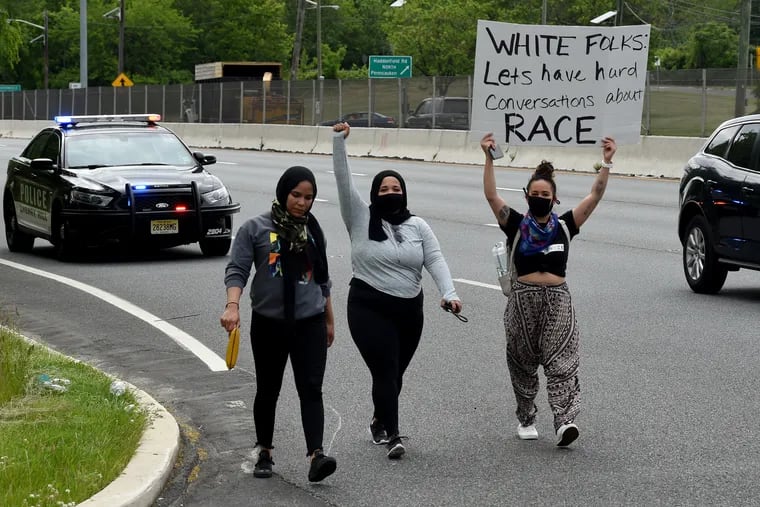 FILE: Protesters walk along Route 38 in Cherry Hill June 2, 2020 during a four-hour march,  as demonstrations in the region continued following the death of George Floyd. They completed their march at the Cherry Hill Mall, where they were met by a line of New Jersey State Police and eventually left.
