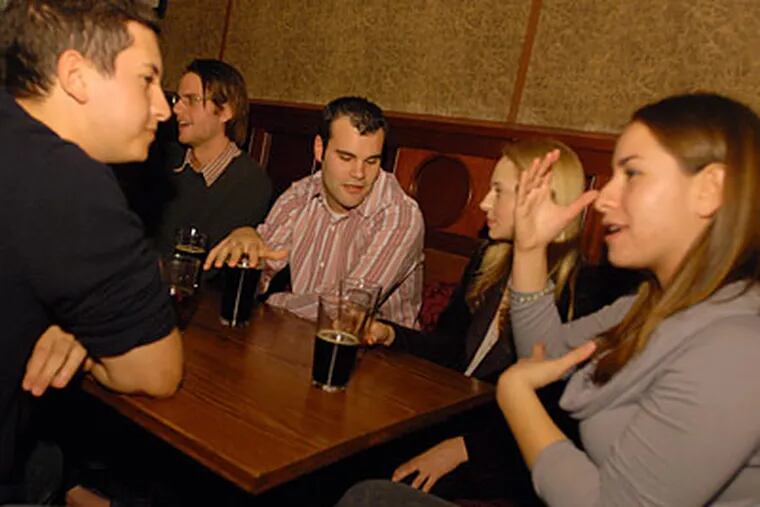 Ari Brownstein, Kevin Owocki, Greg Lopiccolo, Candace Stearns and Erica Goldberg (from left to right) on a group date at Nodding Head. (Ron Tarver/Staff Photographer)