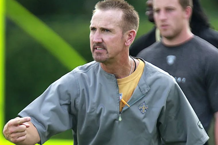 New Orleans Saints defensive coordinator Steve Spagnuolo runs practice at their NFL football training facility in Metairie, La., Thursday, May 31, 2012. (AP Photo/Gerald Herbert)