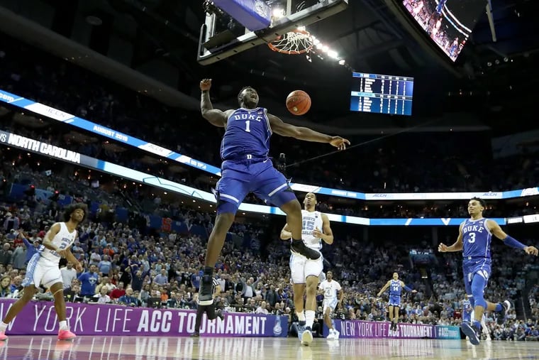 Zion Williamson dunks during the semifinals of the ACC Tournament, his first action since suffering a knee injury in February.