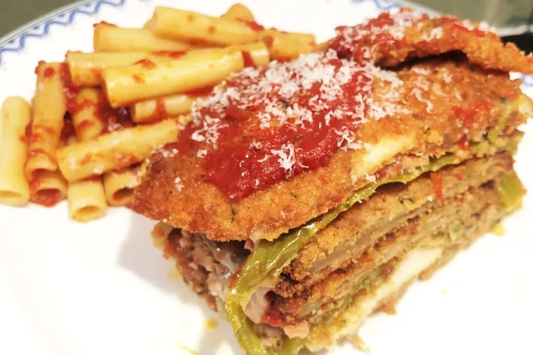 Cotoletta's signature "Stack," which layers chicken Parmesan, eggplant and sausage-stuffed long hot peppers, is available for takeout in a massive, lasagna-style family-sized pan.