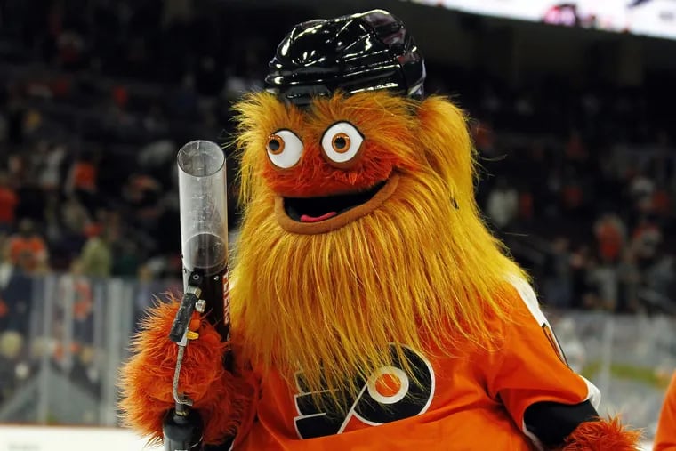 The Philadelphia Flyers mascot, Gritty, takes to the ice during the first intermission of the Flyers preseason NHL hockey game against the Boston Bruins, Monday, Sept, 24, 2018, in Philadelphia.