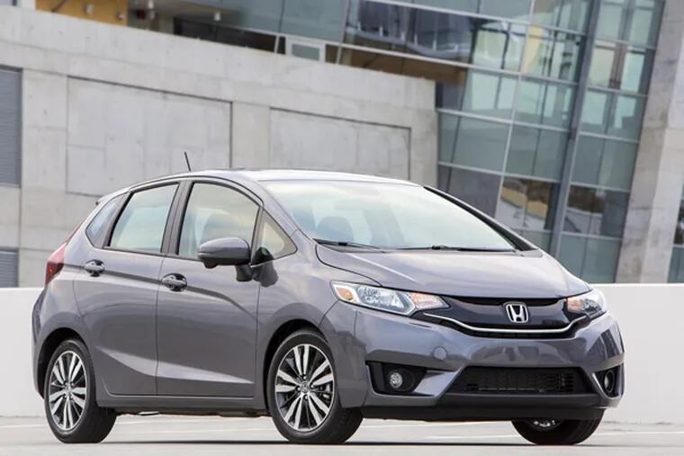 The 2015 Honda Fit adds more fuel efficiency, standard safety features and technology without a significant increase in price. (Honda/MCT)
