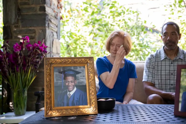 Tracy Mills and Kent Julye posed for a portrait at their home in Philadelphia on Tuesday, July 12, 2022, a day before Global Citizen's annual Beer Summit. Their son, Zachariah Julye, 19, was killed outside of a party in the early morning hours of July 2. Julye was the kickoff speaker at last week's event.