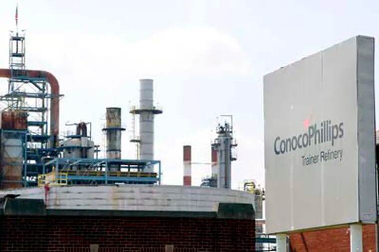 FILE - This Thursday, April 19, 2012 file photo shows the ConocoPhillips refinery in Trainer, Pa., near Philadelphia.  Delta Air Lines Inc. Monday, April 30, 2012 said it will buy the refinery as part of an unprecedented deal that it hopes will cut its jet fuel bill. Delta is buying the Trainer, Pa. refinery from Phillips 66, a refining company being spun off from ConocoPhillips. Delta says a subsidiary will pay $150 million, including $30 million in job-creation assistance it is getting from the state of Pennsylvania. (AP Photo/Alex Brandon)