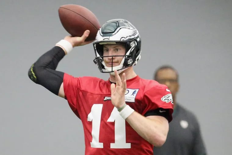 Eagles quarterback Carson Wentz throws a pass during practice at the NovaCare Complex in South Philadelphia on Tuesday, May 22, 2018. Tuesday was the first day of the Eagles' organized team activities.