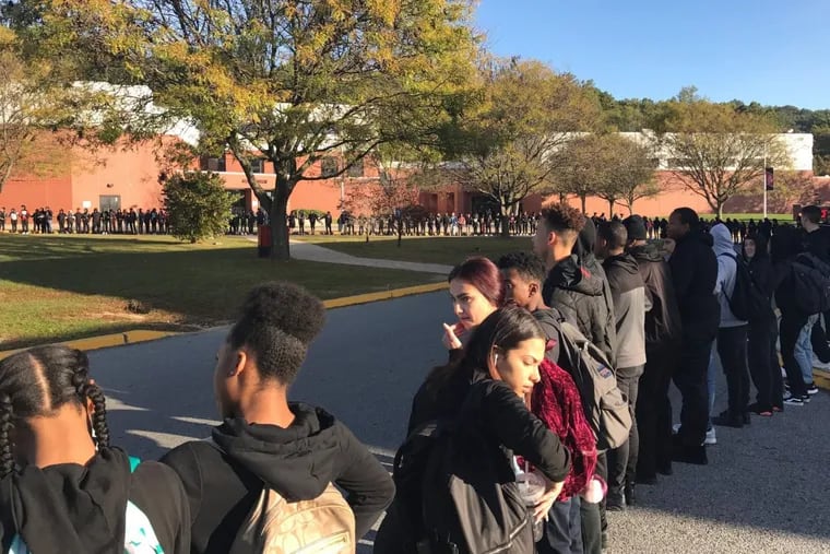 Students protest outside Coatesville Area High School on Friday.