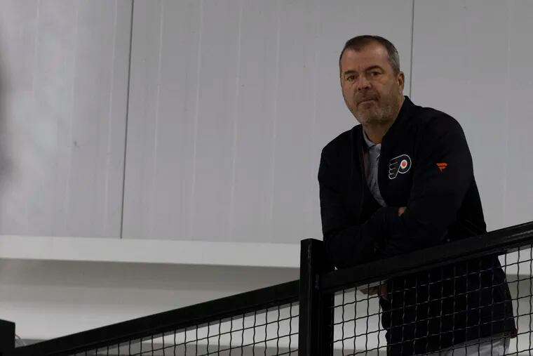 Flyers head coach Alain Vigneault looks on during rookie camp.