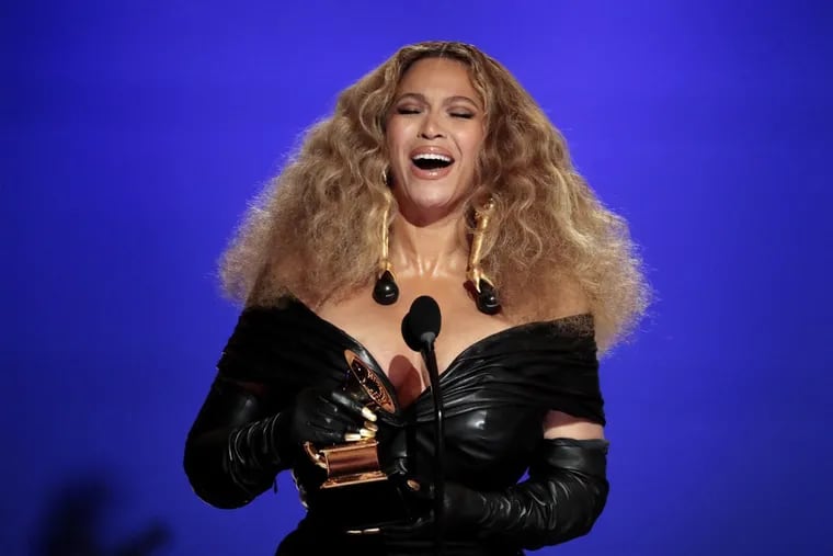 Beyonce accepts the award for best R&B performance at the 63rd Grammy Awards on March 14, 2021, in Los Angeles. She leads the way with nine nominations at this year's Grammy Awards, which be telecast from Los Angeles on Sunday at 8 p.m. on CBS.(Robert Gauthier/Los Angeles Times/TNS)