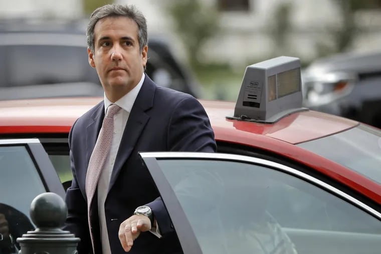 In this Sept. 19, 2017, file photo, Michael Cohen, personal attorney of President Trump, steps out of a cab during his arrival on Capitol Hill in Washington.