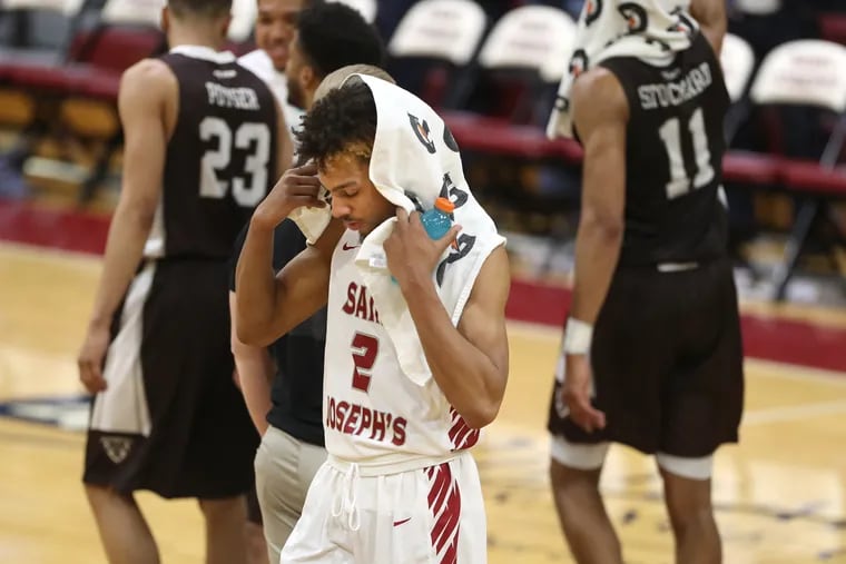 Charlies Brown of St. Joseph’s walks off the court after their loss to St. Bonaventure on Feb. 12, 2019.