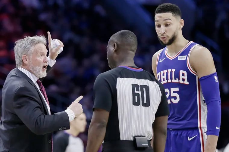 Sixers head coach Brett Brown and Ben Simmons complain about a foul called on Simmons in the 2nd half of the Brooklyn Nets vs. Phila. 76ers NBA game at the Wells Fargo Center in Phila., Pa. on March 28, 2019.
