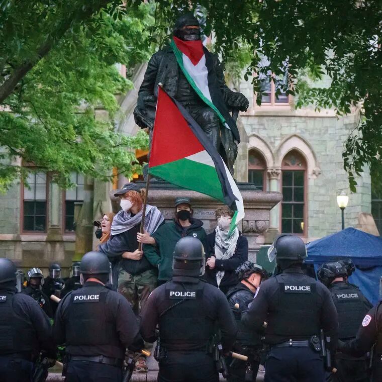 Police confront protesters at the University of Pennsylvania campus on Friday. The pro-Palestinian encampment that had been there for 16 days was dismantled.