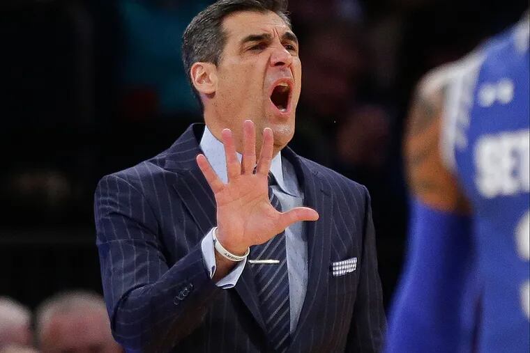 Villanova head coach Jay Wright calls out to his team during the first
half of an NCAA college basketball game against Seton Hall during the
Big East men's tournament Saturday, March 12, 2016, in New York.