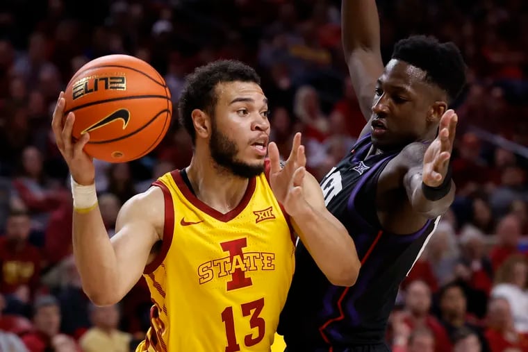 Iowa State junior guard and leading scorer Jaren Holmes (left) looks to make a pass in a game against TCU last month. Holmes and the Cyclones have the fifth-best odds at BetMGM to win their fifth Big 12 Tournament in the last 10 years. (Photo by David Purdy/Getty Images)
