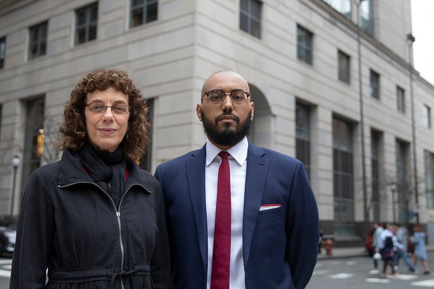 Robin Forrest and John Lopez, of the Defenders Association, outside the Criminal Justice Center in Philadelphia.