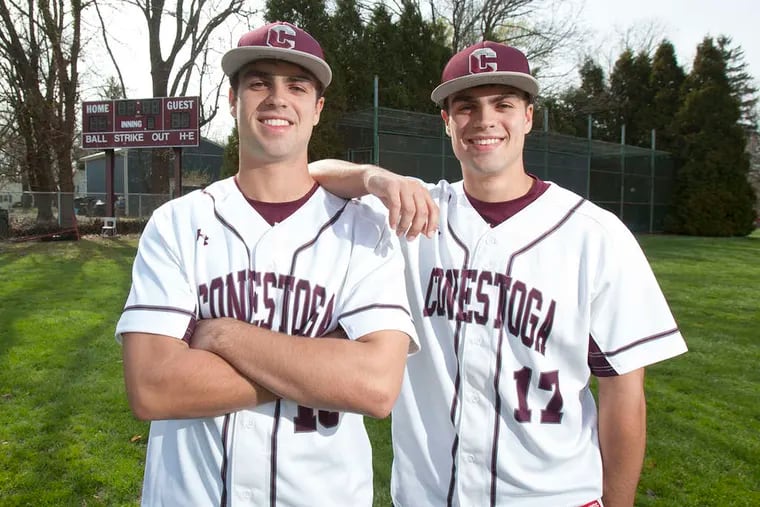 Twins in the outfield: Conestoga's Andrew Born (left) and Steve Born will split up after high school. Andrew will go to Davidson, and Steve will attend the Naval Academy. ED HILLE / Staff Photographer