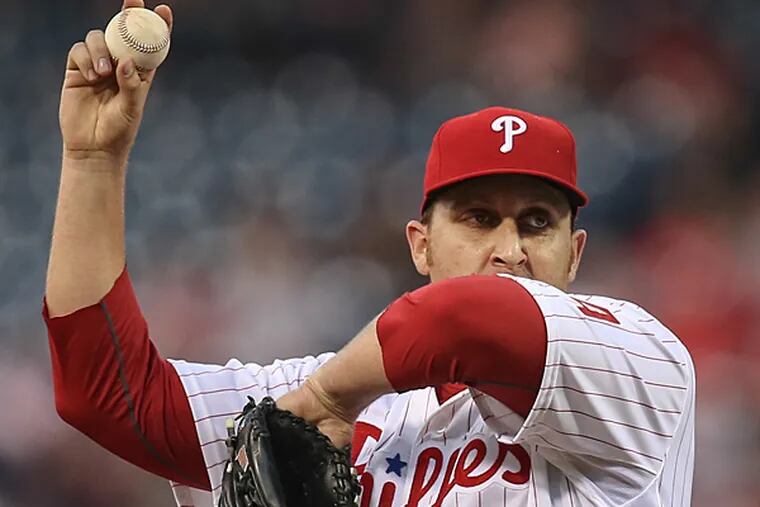 Phillies' pitcher Aaron Harang wipes his face after giving up a two run double to Brewers' Ryan Braun during the 4th inning at Citizens Bank Park in Philadelphia, Wednesday, July 1, 2015. (Steven M. Falk/Staff Photographer)
