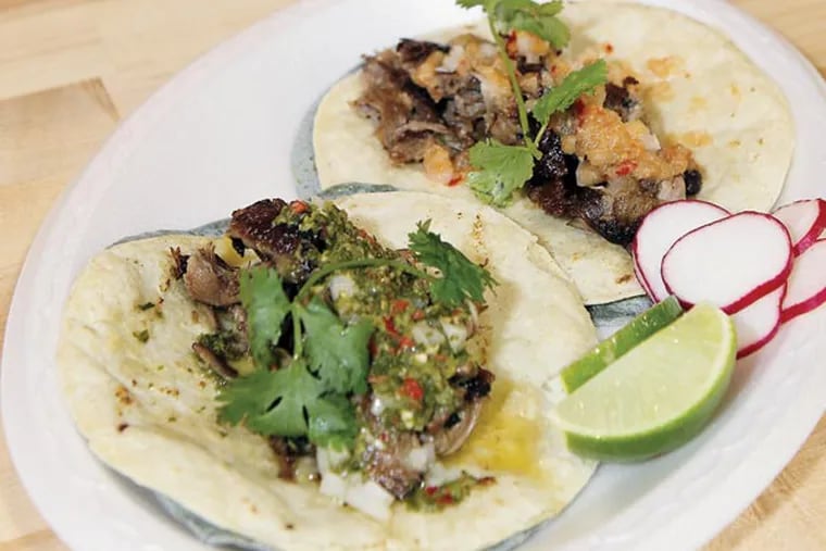 "Classic" lamb tacos with wedge of lime at the Border Springs Farm lamb stand in Reading Terminal Market.
Aug.15, 2013( AKIRA SUWA  /  Staff Photographer )