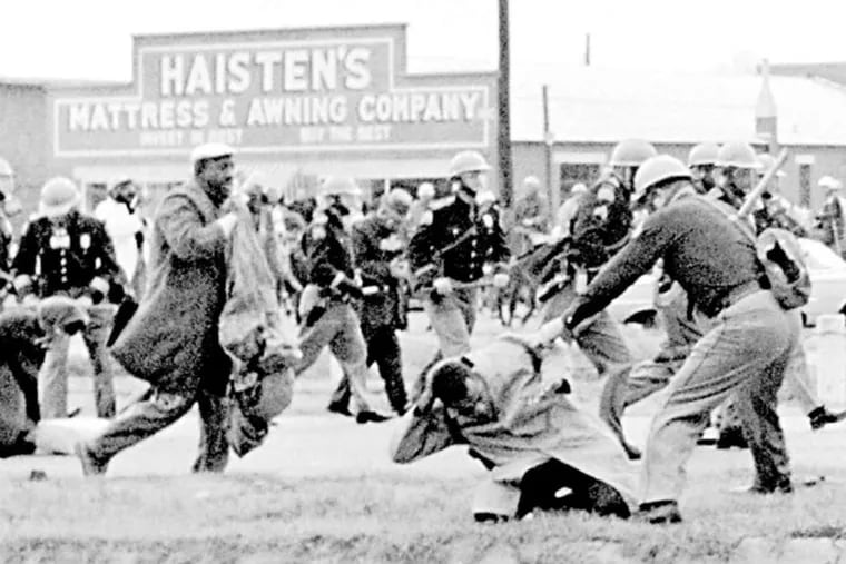 Alabama state troopers attack marchers in Selma on March 7, 1965.