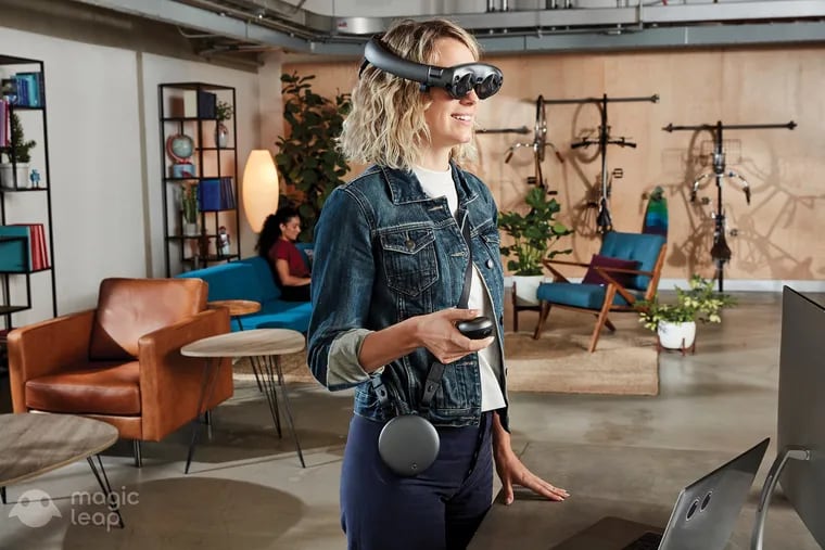 A woman wears the Creator Edition of the Magic Leap Leap One. The Florida company is now going after surgeons and other medical customers.  (Magic Leap)
