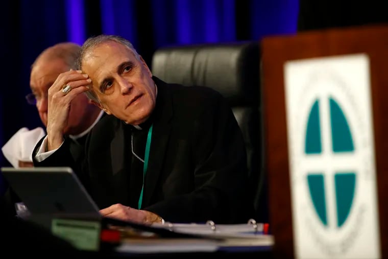 Cardinal Daniel DiNardo of the Archdiocese of Galveston-Houston, president of the United States Conference of Catholic Bishops, prepares to lead the USCCB's annual fall meeting Monday in Baltimore.