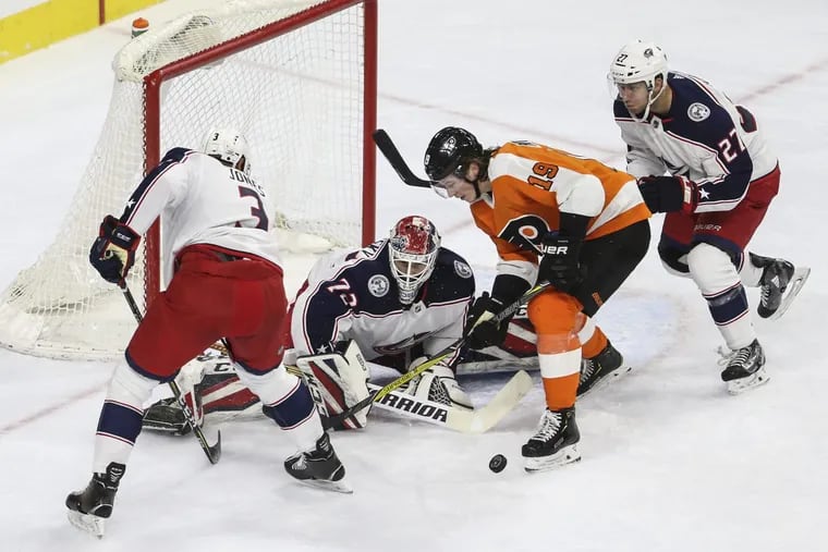 Flyers’ rookie Nolan Patrick tries to get the puck past Blue Jackets’ goalie and former Flyer Sergei Bobrovsky in the team’s 2-1 win.
