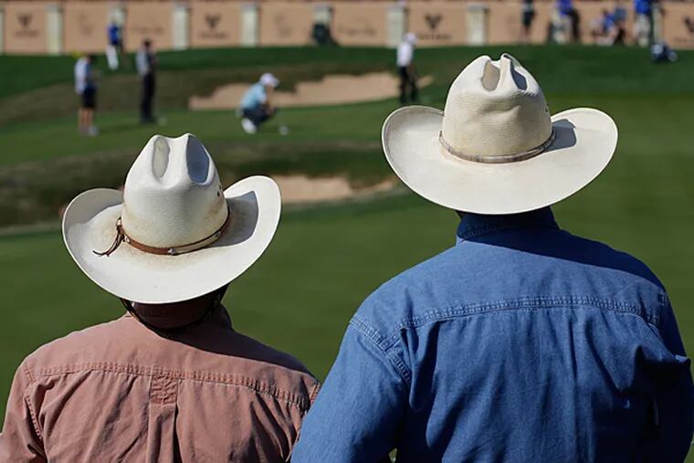 Golf fans watch the second round of the Valero Texas Open golf tournament, Friday, March 28, 2014, in San Antonio. (Eric Gay/AP)