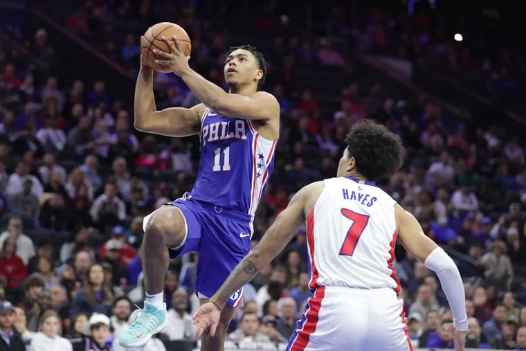 Jaden Springer (left) of the Sixers goes up for a shot against Killian Hayes of the Pistons during their game at the Wells Fargo Center in January.