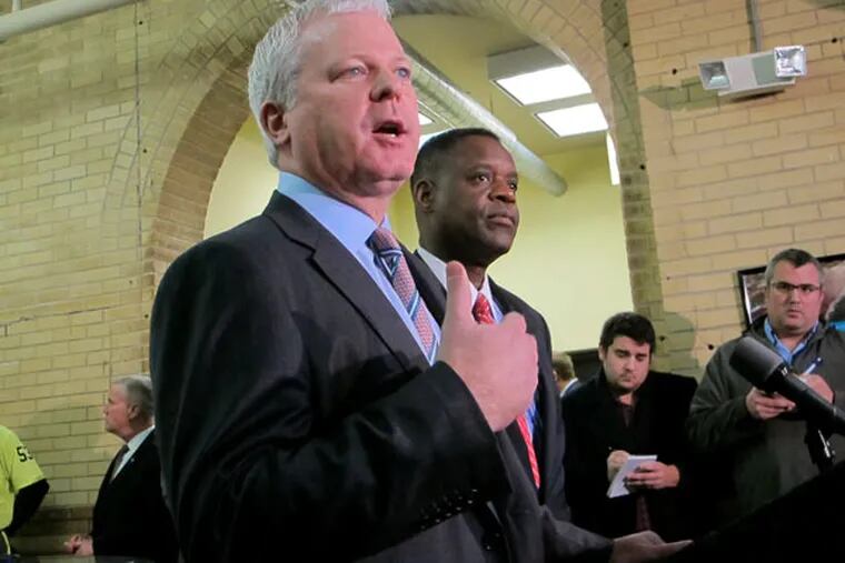 Kevin Lavin, left, and Kevyn Orr speak at a press conference in Atlantic City on Thursday, Jan. 22, 2015. (AP Photo/Wayne Parry)