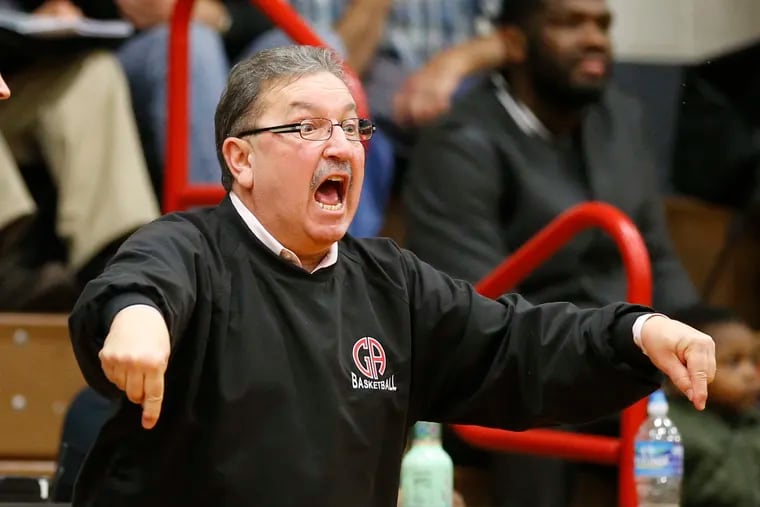 JHead Coach Jim Fenerty of Germantown Academy question an official's call during the 1st half of their game against Del-Val Charter on Dec. 23, 2015.  Del-Val Charter won 68-64.   ( CHARLES FOX / Staff Photographer )