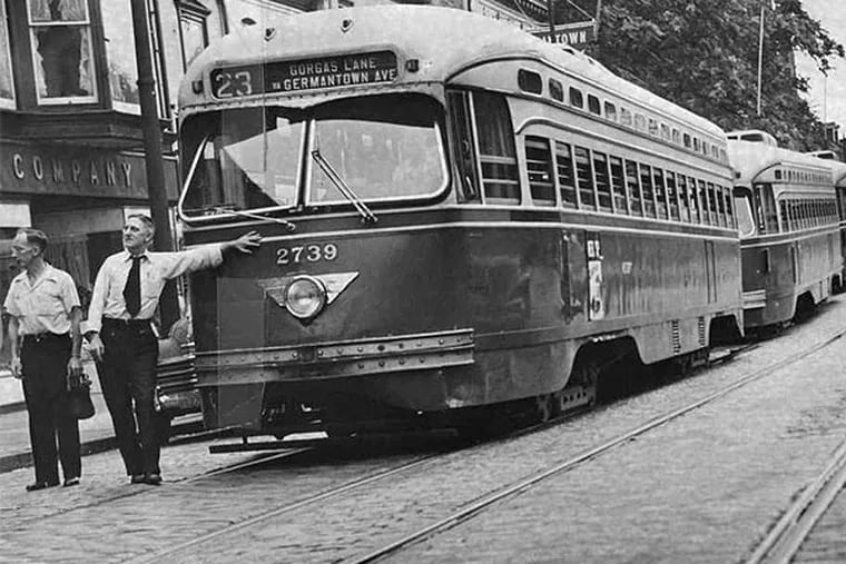 A line of trolleys on the 5400 block of Germantown Avenue in 1949. In February 1964, SEPTA held its first organizational meeting. (Inquirer File Photo)