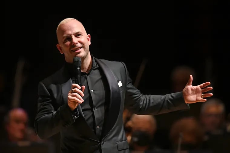 Conductor Yannick Nezet-Seguin speaks to the audience from the stage at Verizon Hall on opening night for the Philadelphia Orchestra at the Kimmel Center Oct. 5, 2021,