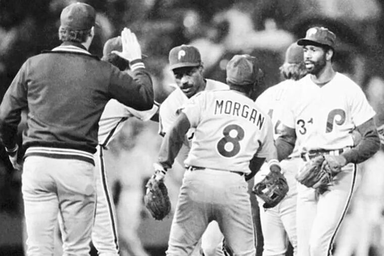 The Phillies gather on the field after beating the Orioles in the opening game of the World Series at Memorial Stadium in Baltimore on Tuesday, Oct. 12, 1983. (AP Photo)