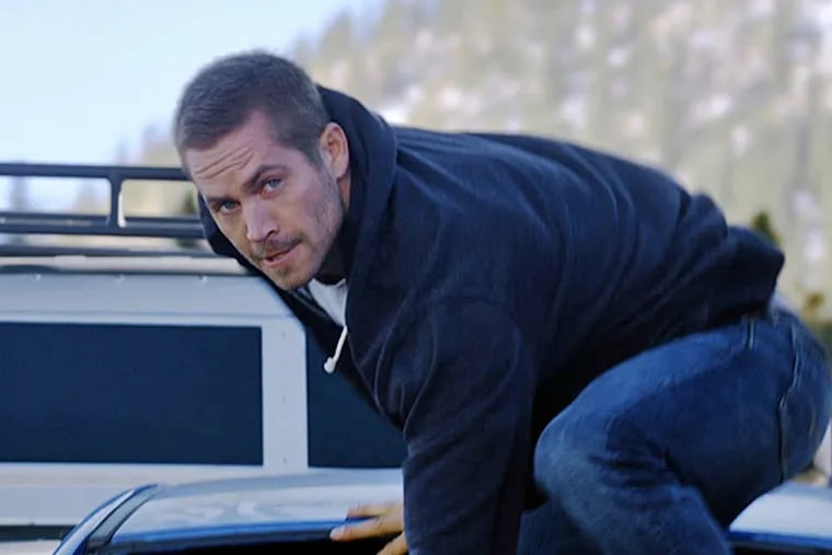 Paul Walker in &quot;Furious 7.&quot; The auto-action series gives the actor, who died before the film was finished, a fitting send-off. (Universal Studios)