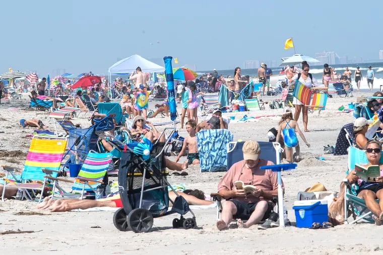 A crowd flocked to the beach in Strathmere, N.J., on Thursday, July 2.