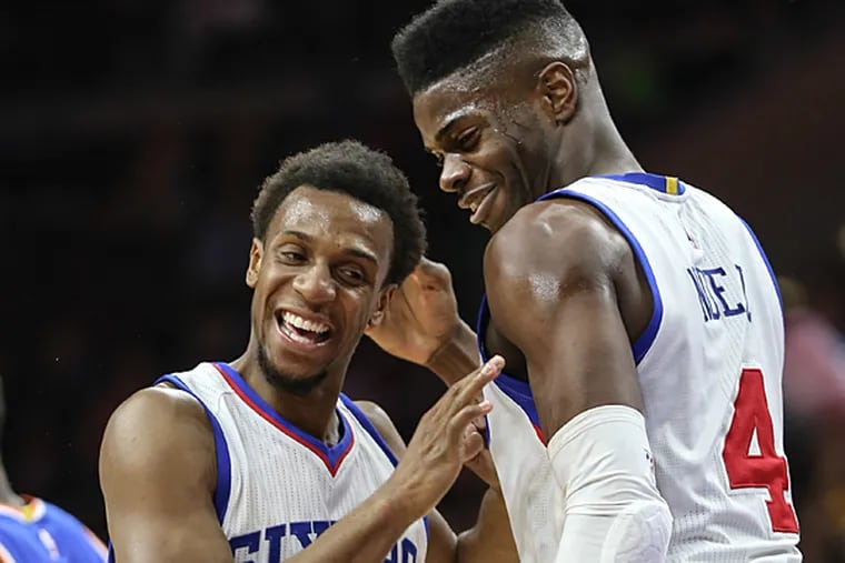 Nerlens Noel (right) and Ish Smith. (Steven M. Falk/Staff Photographer)