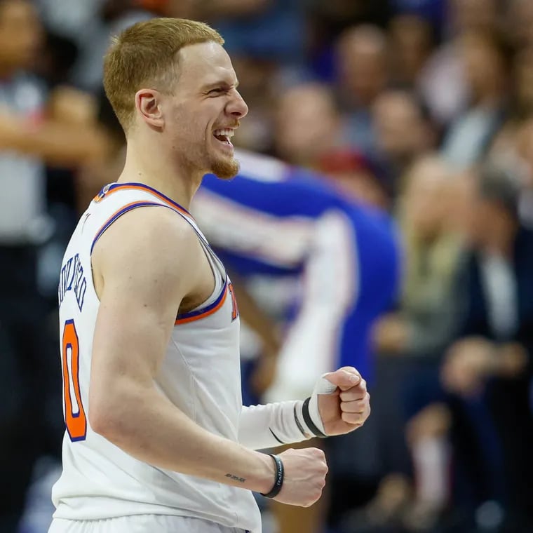 Knicks guard Donte DiVincenzo, a Delaware native, celebrates a fourth-quarter lead over the Sixers in Game 6 of their playoff series.