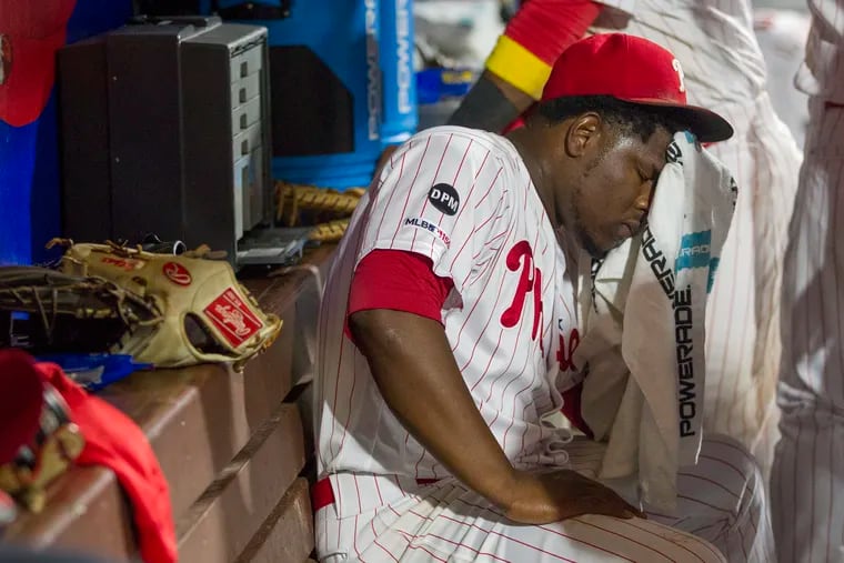 Hector Neris of the Phillies sat in the dugout after giving up the go-ahead run to the Red Sox in the ninth inning at Citizens Bank Park on Sept. 14, 2019. The Red Sox won, 2-1.