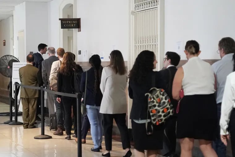 People line up outside courtroom 456 before the Philadelphia District Attorney's Office, the Pennsylvania Attorney General's Office, and attorneys with the Federal Community Defender Office, argued about the constitutionality of the state's death penalty, at Philadelphia's City Hall on Sept. 11, 2019. The Supreme Court rejected a petition against the death penalty on Sept. 26.