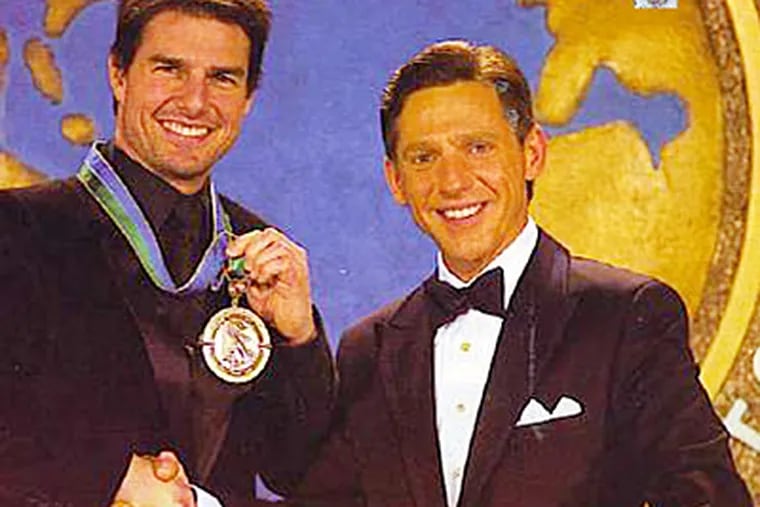 Tom Cruise, left, with David Miscavige, who was born in Bucks County and spent his first 12 years in Willingboro, N.J.