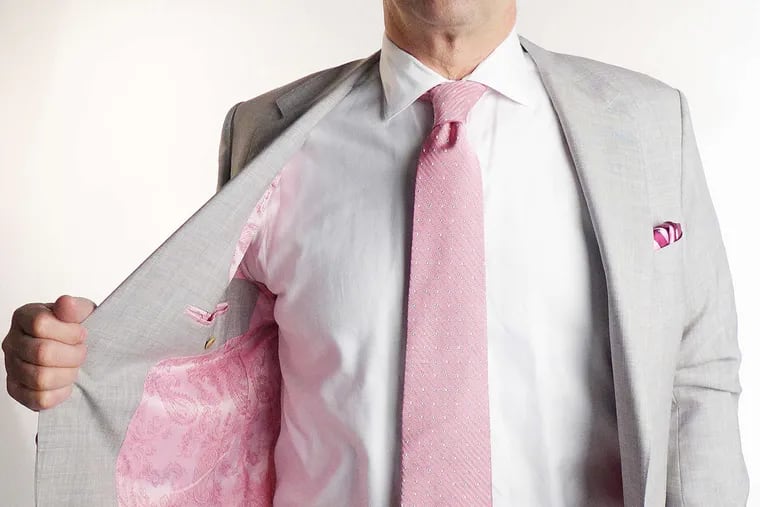Attorney David Maser sports a suit jacket with a bold pink paisley lining custom made by Henry A. Davidsen, Master Tailors & Image Consultants. Davidsen's custom suits range in price from $1,500 to $3,000.