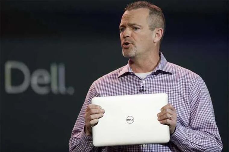 Jeff Clarke, vice chairman of global operations at Dell, introduces an XPS Ultrabook during the 2012 International CES tradeshow, Tuesday, Jan. 10, 2012, in Las Vegas.  (AP Photo/Julie Jacobson)