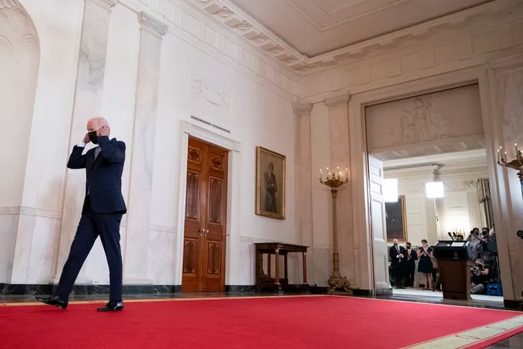 President Joe Biden walks from the podium after speaking about the end of the war in Afghanistan in the White House on Tuesday. Solomon Jones writes that Biden made the correct decision to end the conflict — but may still end up paying a steep political price.